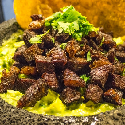 Rib eye cracklings in guacamole